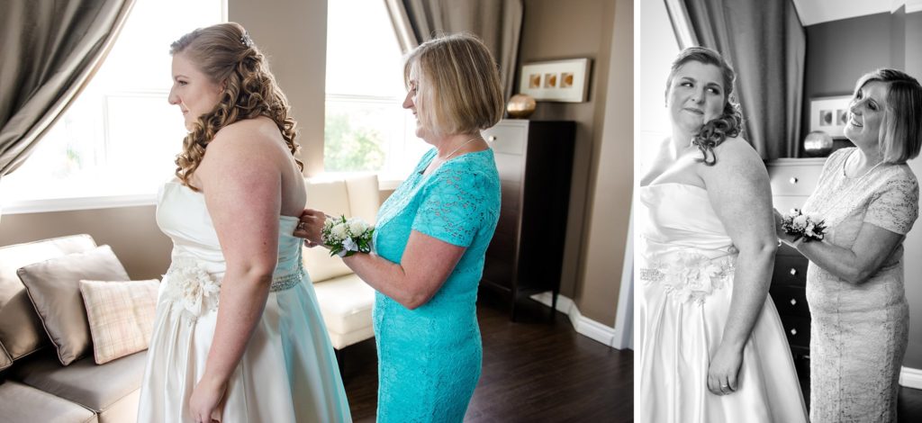 a mother of the bride does up the bride's wedding dress