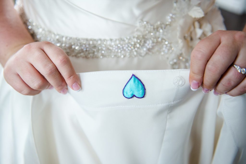 a heart sewn inside a wedding dress as 'something blue'