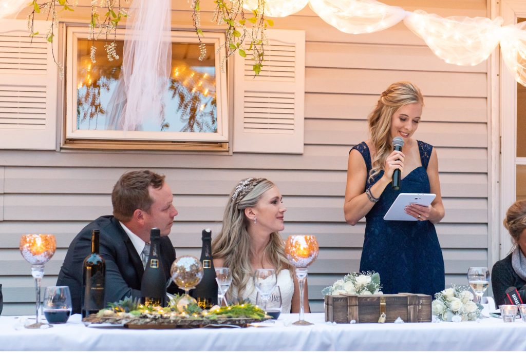 the maid of honour gives a speech at a Grand Bend wedding