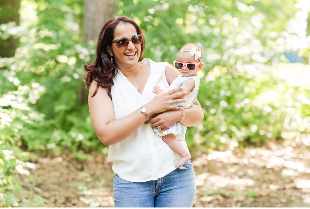 a mom and her daughter wearing sunglasses for family photos