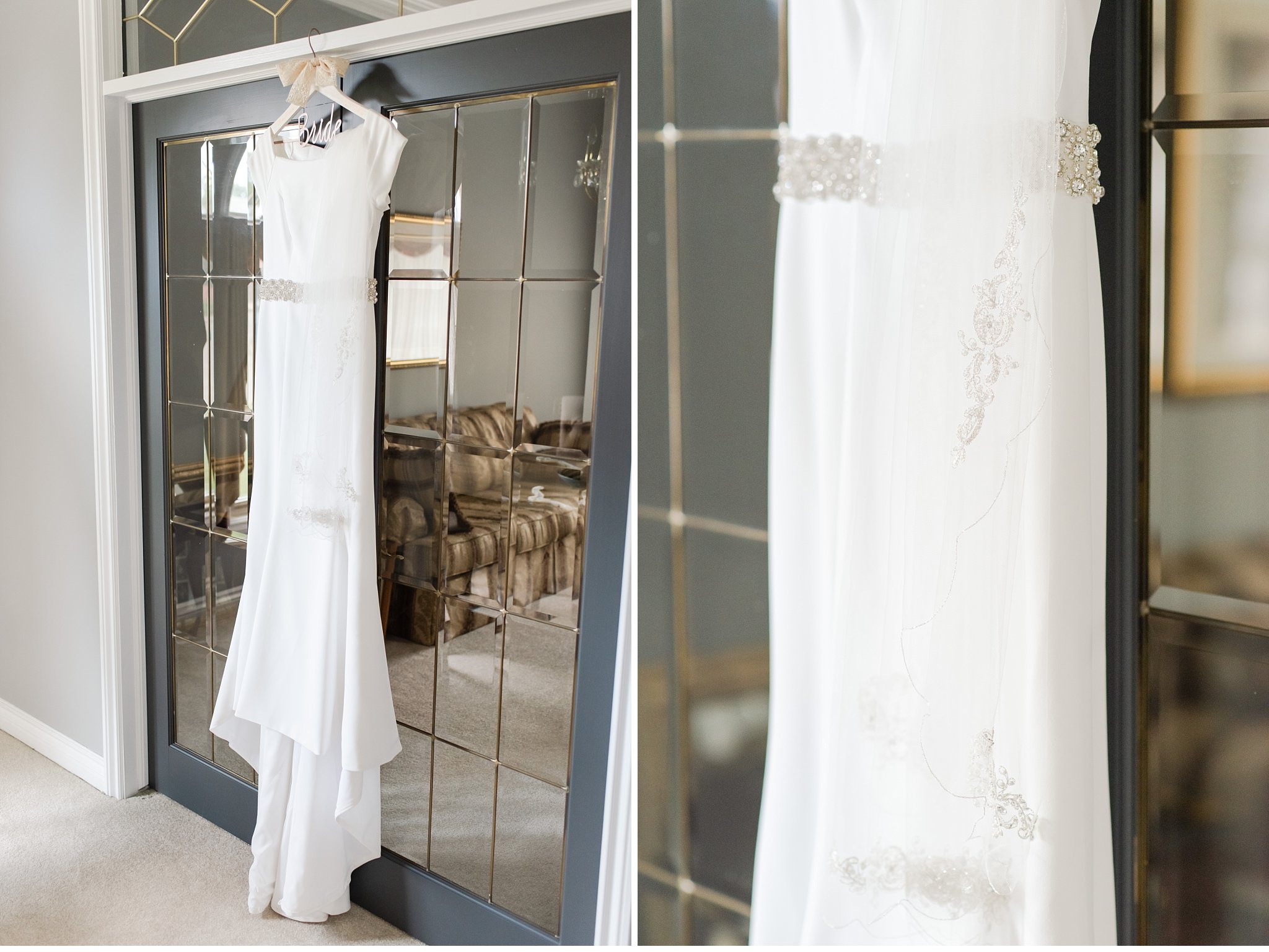 wedding dress hanging in a doorway
