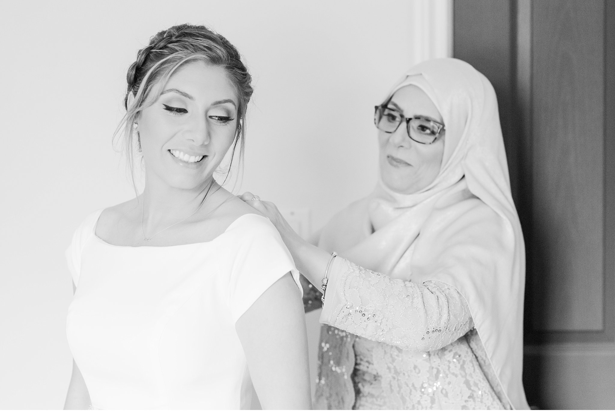 mom helping bride get ready by london ontario wedding photographer life is beautiful photography