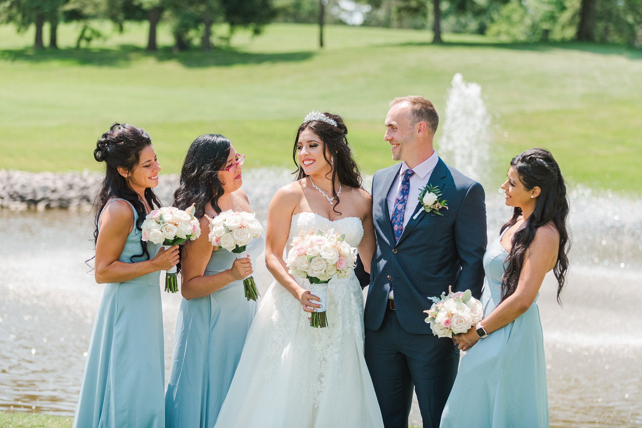 a wedding party laughing together