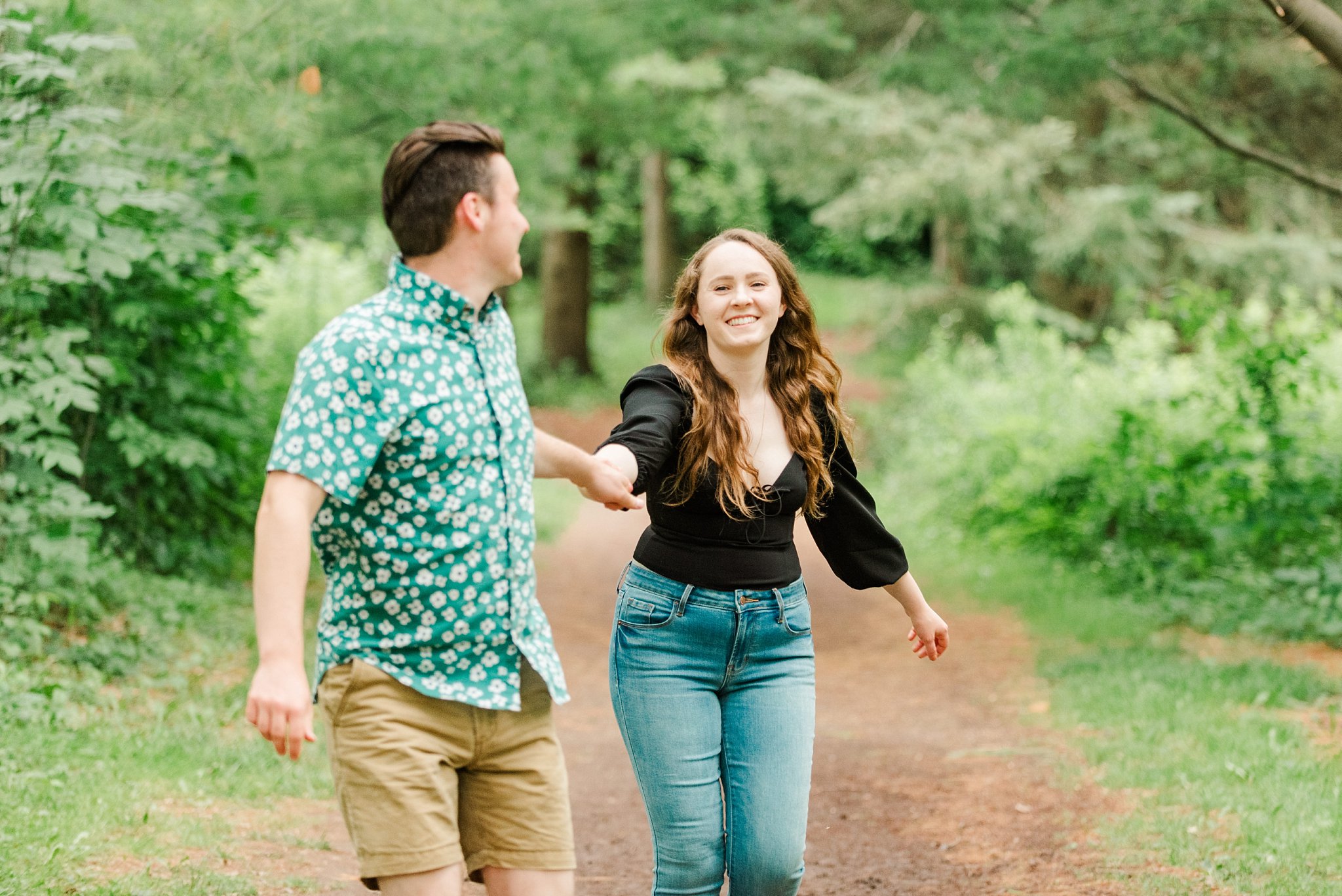a couple runs together through guelph arboretum