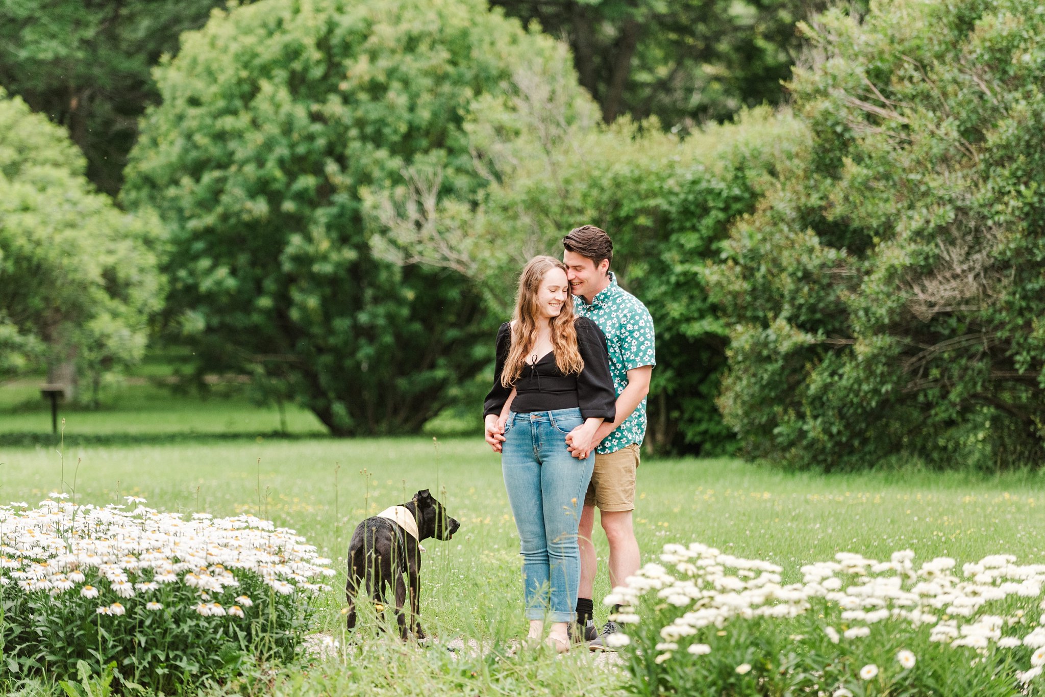 a couple stands on a path near a garden by guelph arboretum wedding photographer life is beautiful photography