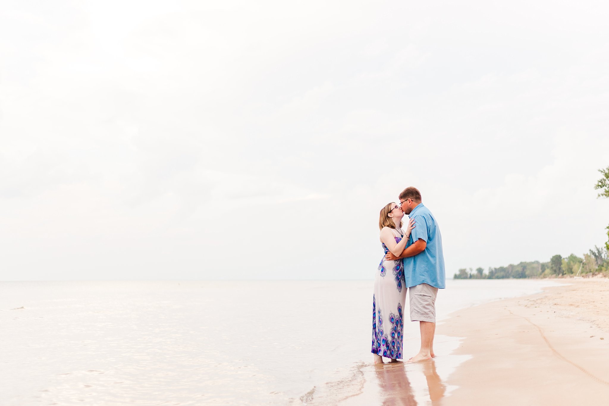 a couple kisses on the shore of ipperwash beach