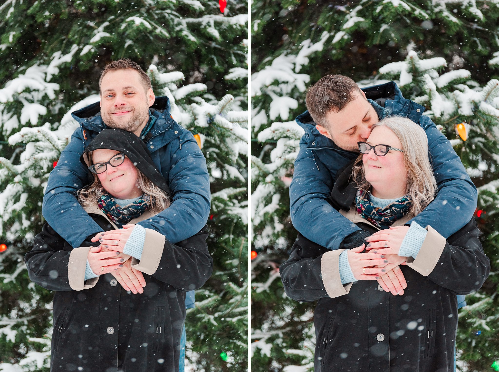 a man kisses a woman on the cheek while standing in front of a snowy christmas tree
