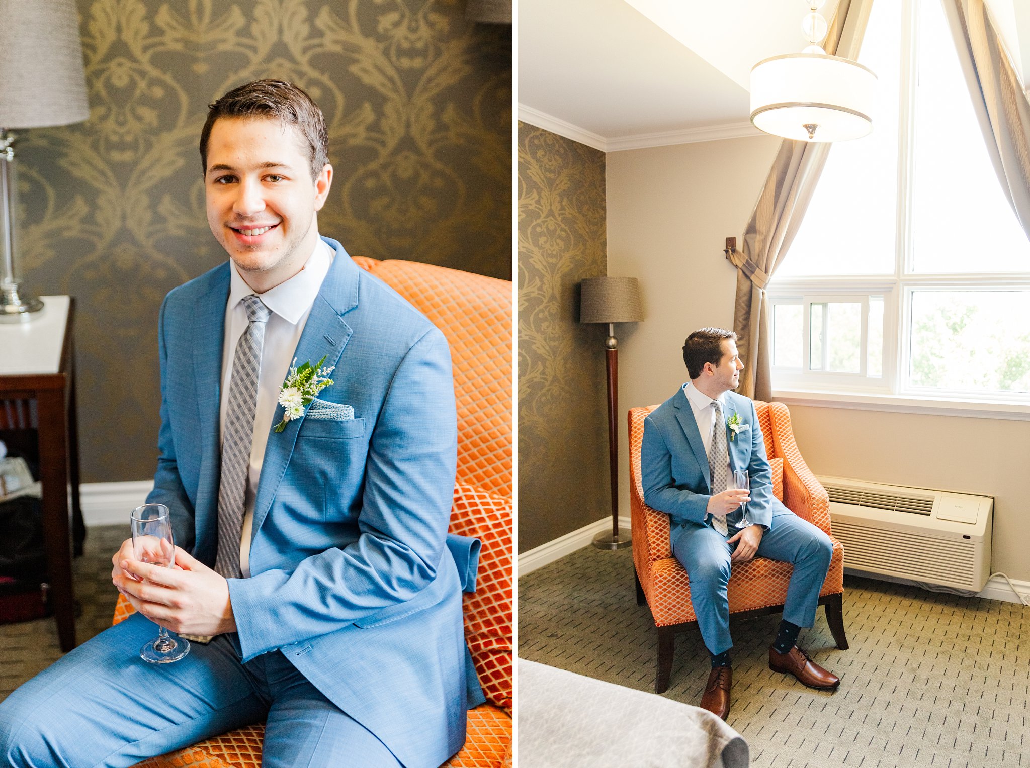 a groom in a blue suit sits on an orange chair at the elm hurst inn