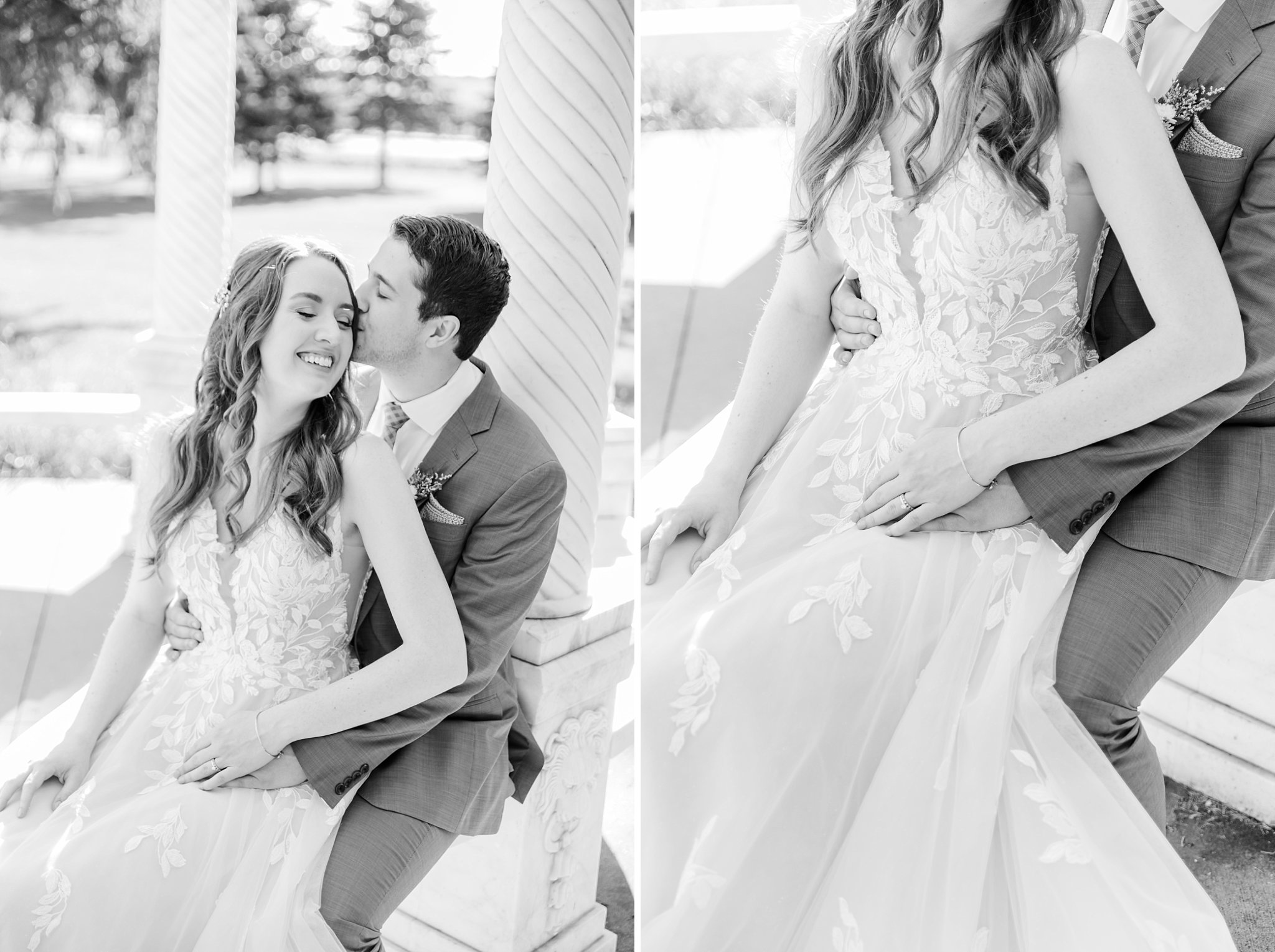 a groom kisses a bride's forehead while they sit together on a bench