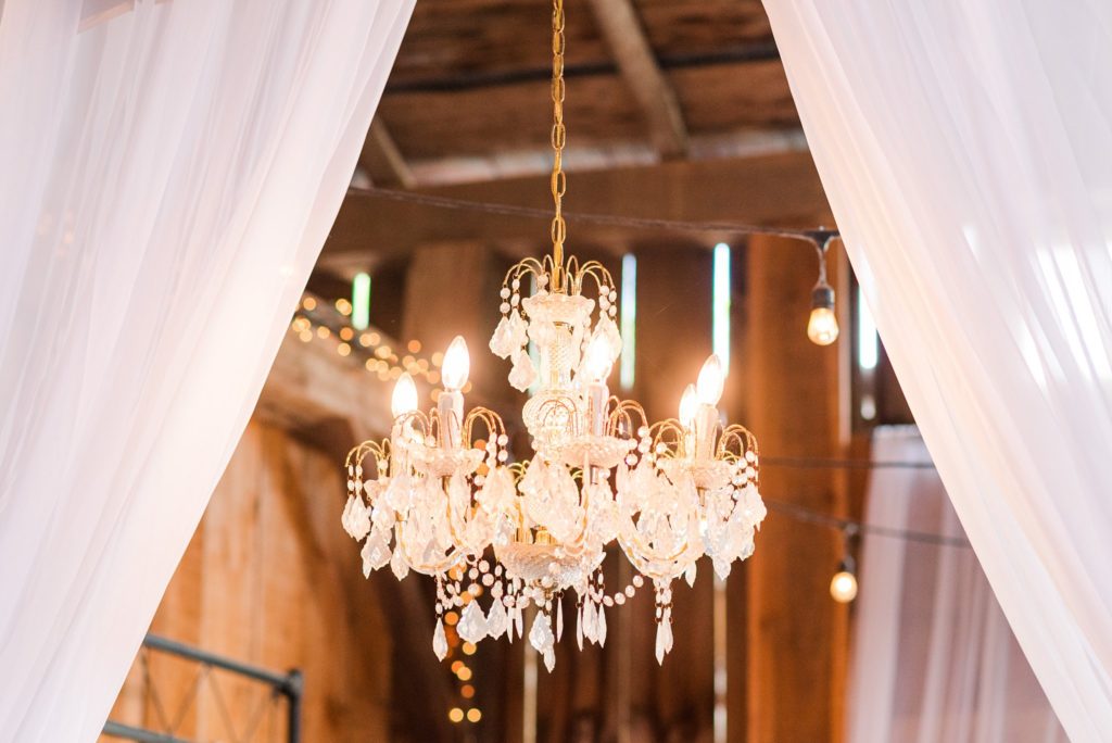 a chandelier at century wedding barn
