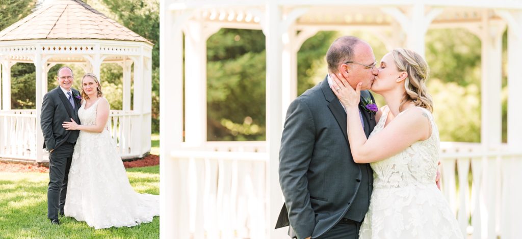 a bride and groom kiss in front of a white gazebo at century wedding barn