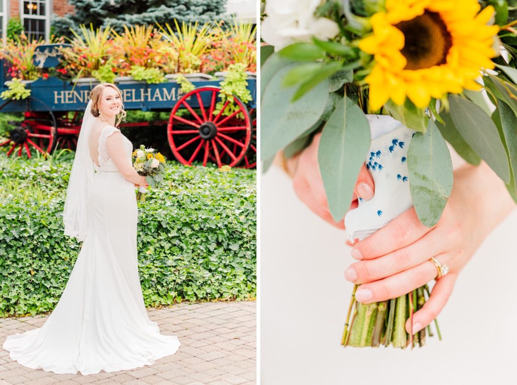 a bride stands with her sunflower bouquet at henry of pelham winery