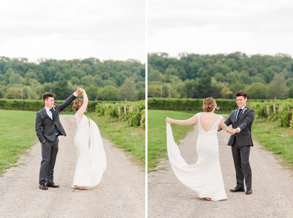 a groom twirls a bride at henry of pelham winery